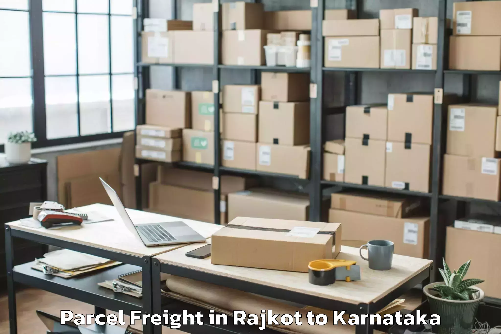 Top Rajkot to Aland Kalaburagi Parcel Freight Available